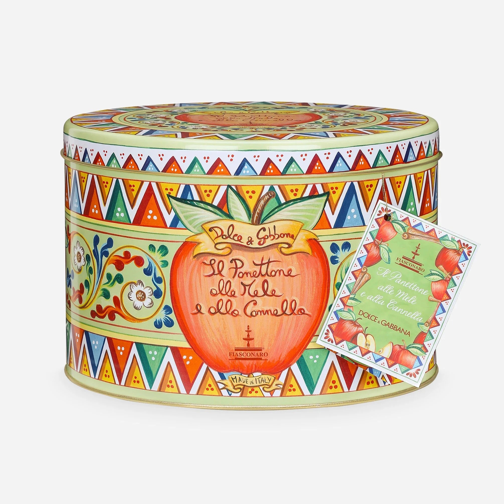 Decorative tin with colorful design and apple illustration on a white background