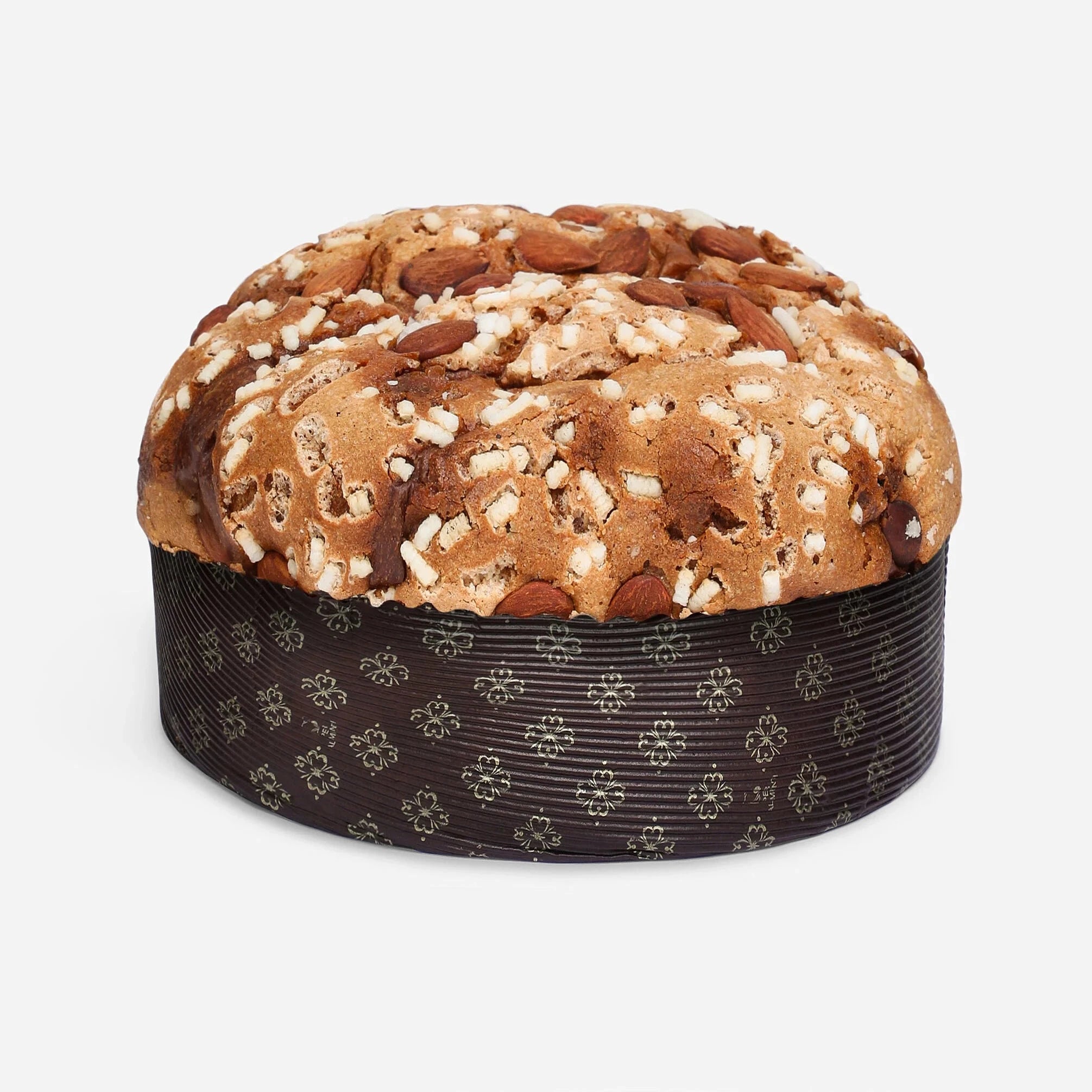 Round bread loaf with nuts on a decorative black base against a white background