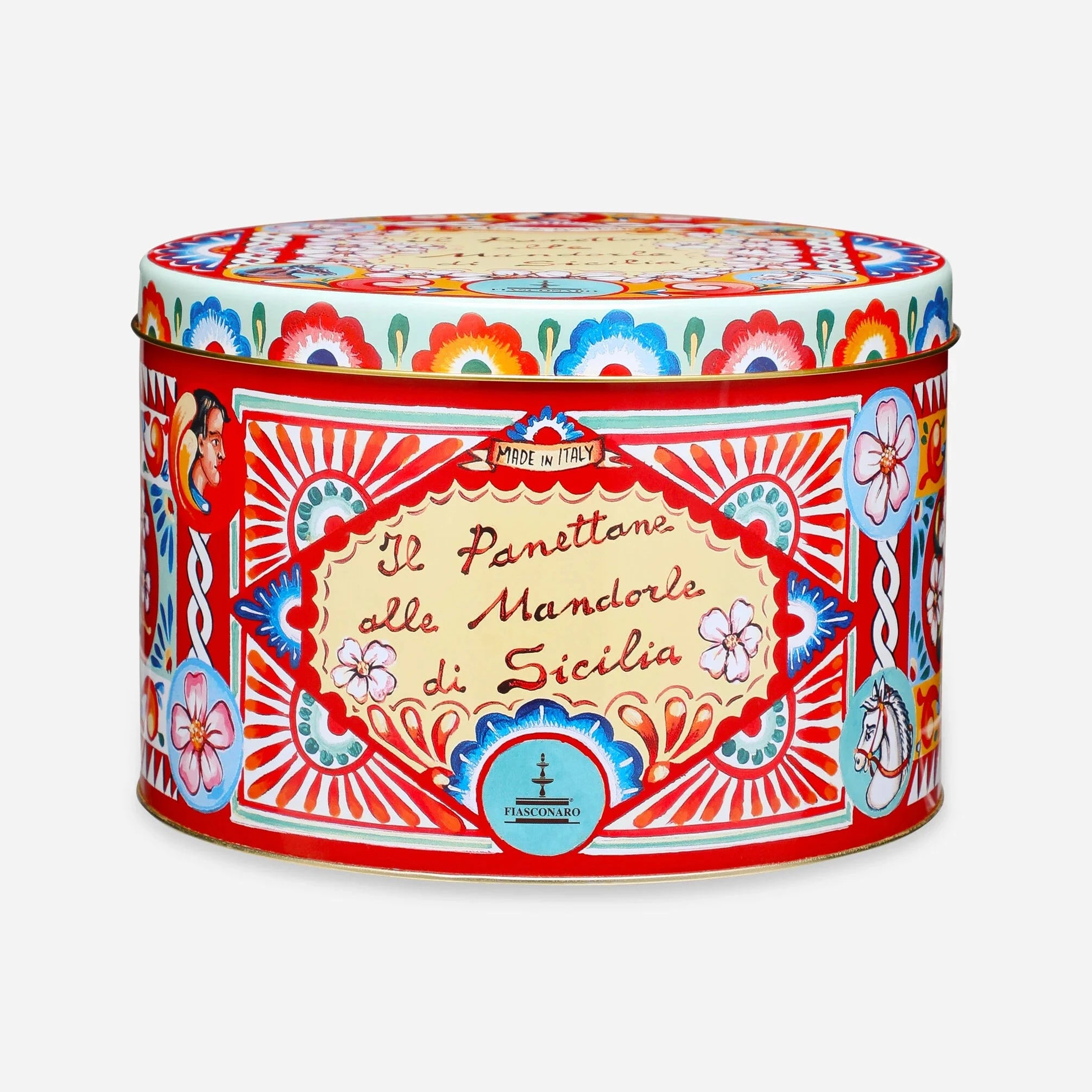 Decorative tin canister with colorful design on a white background